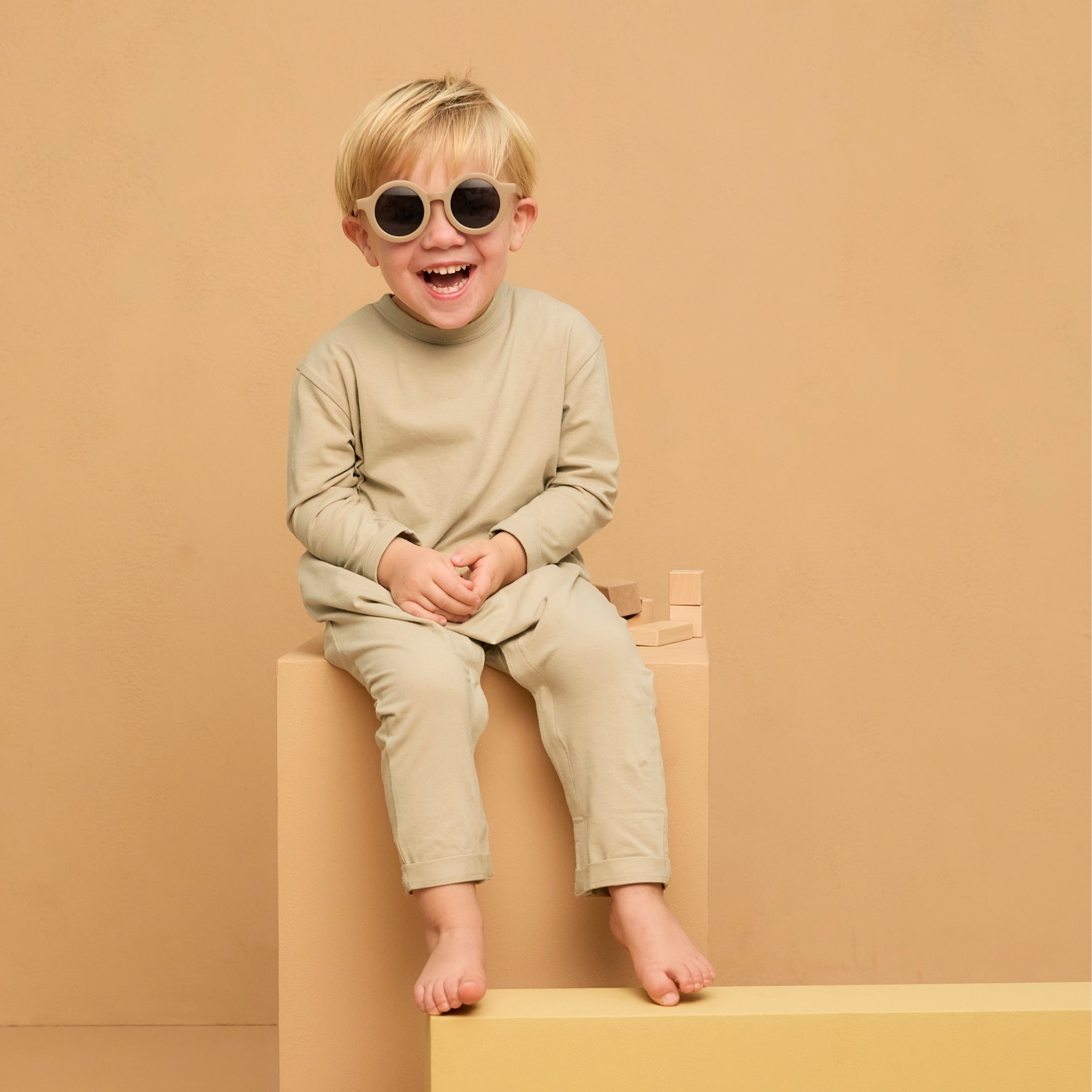 UV onesie, Sandy beach